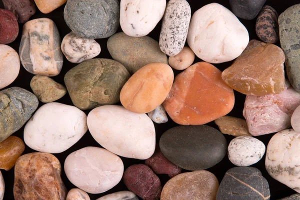 Set of stones on a black background — Stock Photo, Image