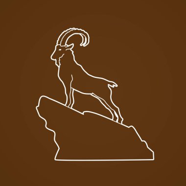 Ibex standing on the cliff  clipart