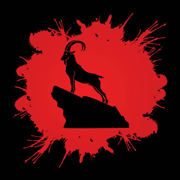 Козерог стоит на скале
 