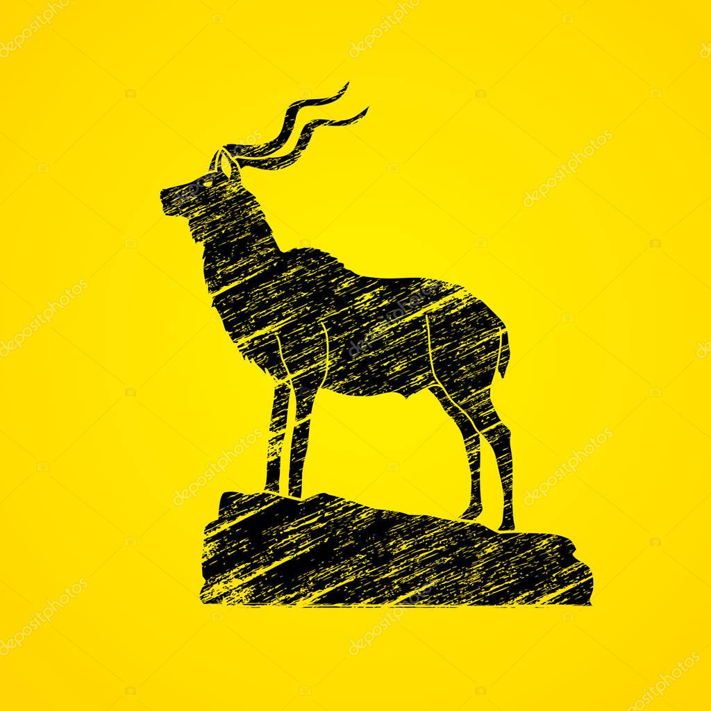 Kudu standing on the cliff graphic vector.