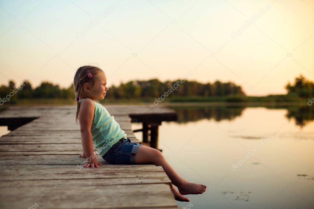 Little girl near the river