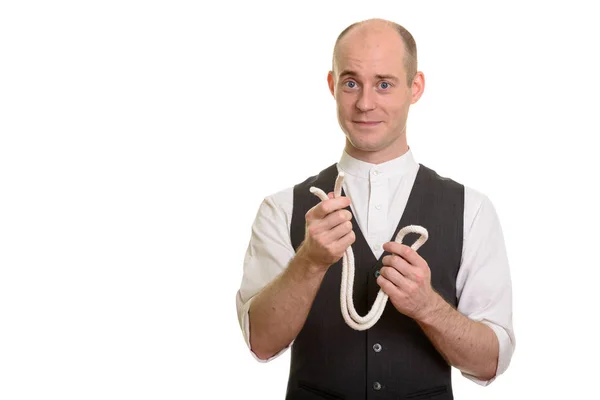 Plešatý běloch kouzelník muž drží lano pro kouzlo trik — Stock fotografie