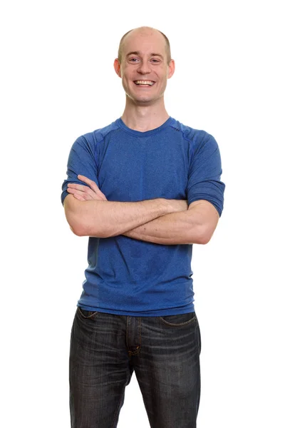 Happy bald Caucasian man smiling with arms crossed — Stock Photo, Image