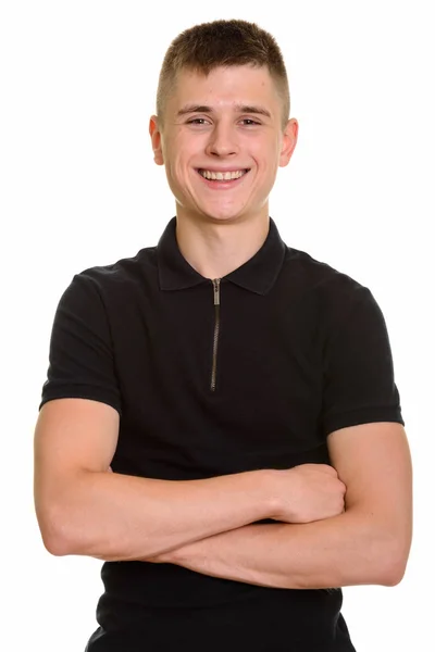 Young happy Caucasian man smiling with arms crossed — Stock Photo, Image