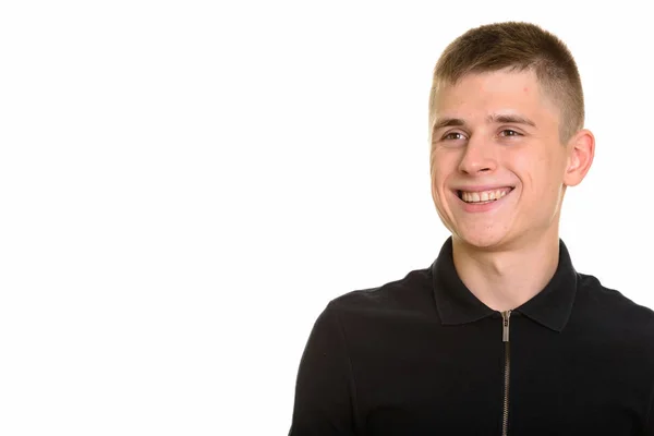 Joven hombre caucásico feliz sonriendo y pensando —  Fotos de Stock