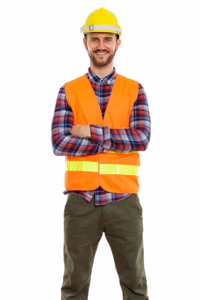 Estudio Joven Feliz Trabajador Construcción Sonriendo Pie Con Los Brazos —  Fotos de Stock