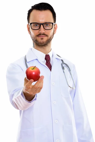 Estúdio Tiro Jovem Médico Dando Maçã Vermelha — Fotografia de Stock