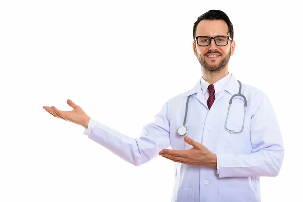 Studio Shot Happy Young Man Doctor Smiling While Showing Something — Stock Photo, Image