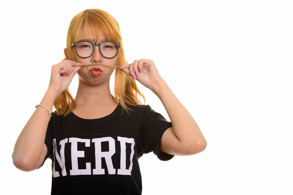 Young Asian Nerd Woman Playing Her Hair Moustache Royalty Free Stock Photos