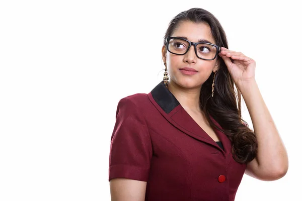 Young Beautiful Indian Businesswoman Thinking While Looking Holding Eyeglasses Royalty Free Stock Photos