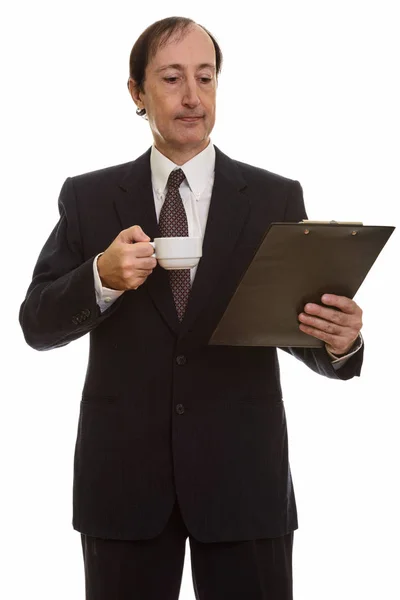 Студійний Знімок Зрілого Бізнесмена Який Тримає Чашку Кави Під Час — стокове фото