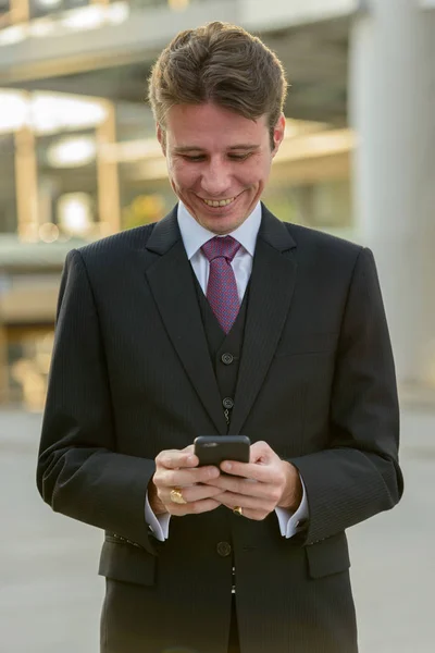 Happy Businessman Smiling Using Mobile Phone Front Modern Building Bangkok — Stock Photo, Image