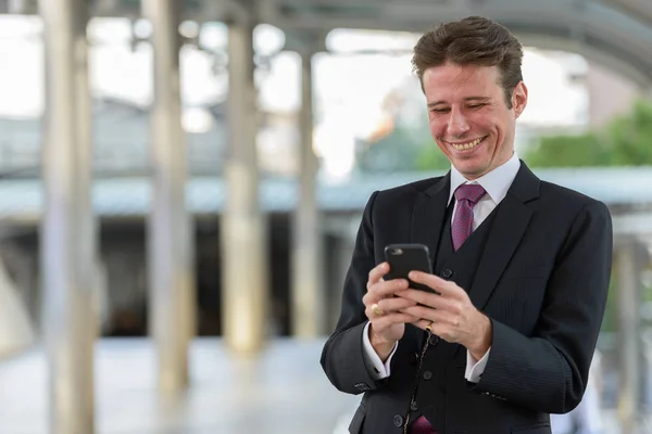 Happy Businessman Smiling Using Mobile Phone Train Station Bangkok City — Stock Photo, Image