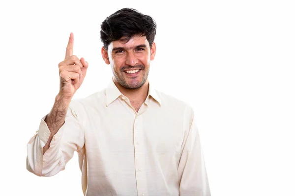 Studio Shot Young Happy Persian Businessman Smiling While Pointing Finger — Stock Photo, Image