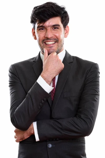 Studio Shot Van Jonge Gelukkig Perzische Zakenman Glimlachen Terwijl Denken — Stockfoto