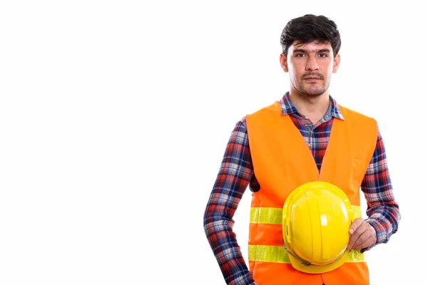 Estudio Joven Trabajador Construcción Persa Sosteniendo Casco Seguridad — Foto de Stock