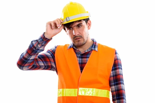 Studio Shot Young Persian Man Construction Worker Thinking While Looking — Stock Photo, Image