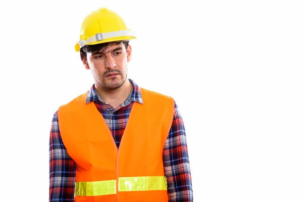 Jovem Homem Persa Trabalhador Construção Pensando Enquanto Olha Triste — Fotografia de Stock