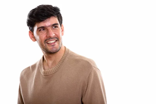 Studio Shot Joven Feliz Hombre Persa Sonriendo Mientras Piensa Mira — Foto de Stock