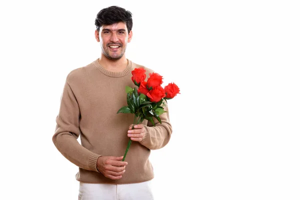 Estudio Tiro Joven Feliz Persa Hombre Sonriendo Mientras Sostiene Rosas — Foto de Stock