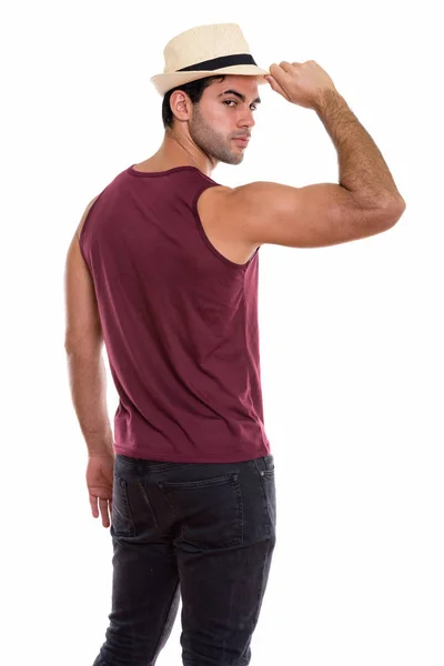 Studio Shot Young Handsome Hispanic Man Holding Hat While Looking — Stock Photo, Image