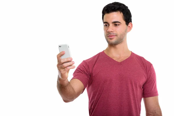 Captura Estudio Joven Apuesto Hombre Hispano Usando Teléfono Móvil —  Fotos de Stock