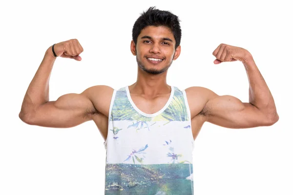 Estúdio Tiro Jovem Feliz Indiano Homem Sorrindo Enquanto Flexionando Ambos — Fotografia de Stock