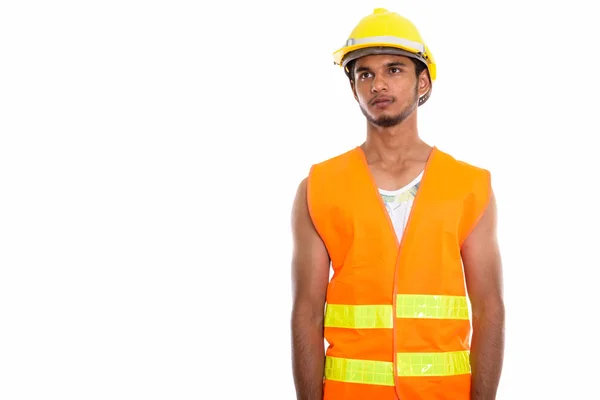 Studioaufnahme Eines Jungen Hübschen Indischen Bauarbeiters Der Nachdenkt Während Nach — Stockfoto