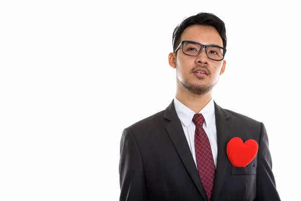Studioaufnahme Eines Jungen Asiatischen Geschäftsmannes Der Mit Rotem Herz Auf — Stockfoto