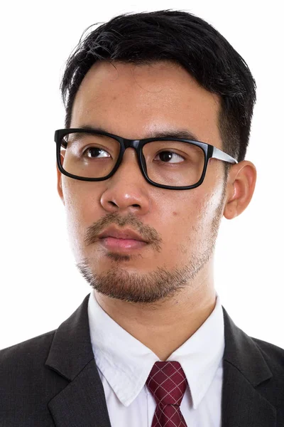 Gözlük Takarken Düşünen Asyalı Genç Işadamının Yüzü — Stok fotoğraf