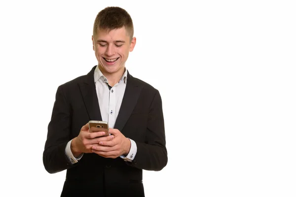 Студійний Знімок Молодого Щасливого Бізнесмена Який Посміхається Використовує Мобільний Телефон — стокове фото