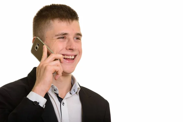 Estúdio Tiro Jovem Empresário Feliz Sorrindo Falando Telefone Celular Enquanto — Fotografia de Stock