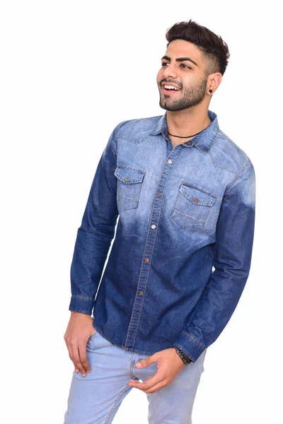 Studio shot of young happy Indian man isolated against white bac — Stock Photo, Image