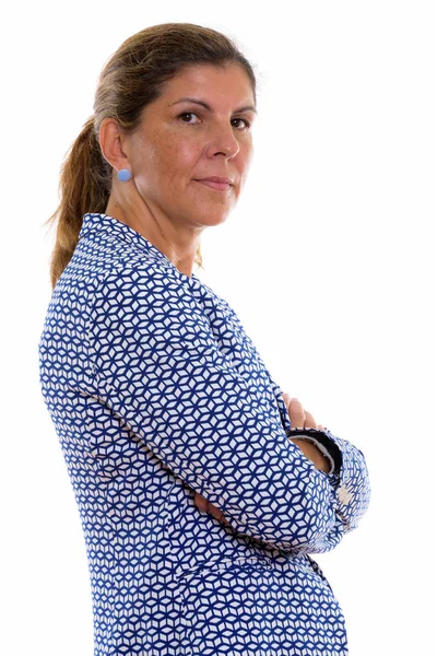 Studio shot of mature beautiful businesswoman with arms crossed — Stock Photo, Image