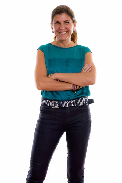 Studio shot of mature happy woman smiling and standing with arms — Stock Photo, Image