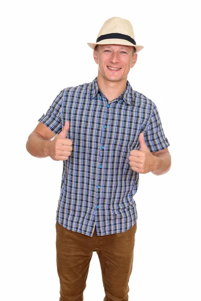 Studio shot of young happy Caucasian man giving thumbs up isolat — Stock Photo, Image