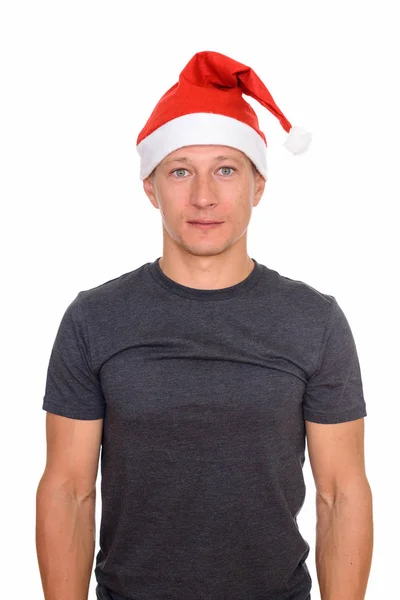 Студийный снимок молодого красивого белого мужчины, готового к Рождеству — стоковое фото