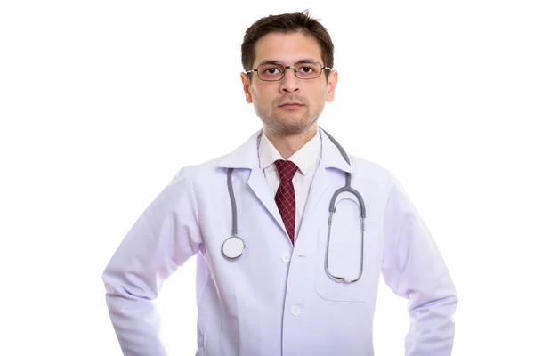 Studio shot of young man doctor wearing eyeglasses — Stock Photo, Image