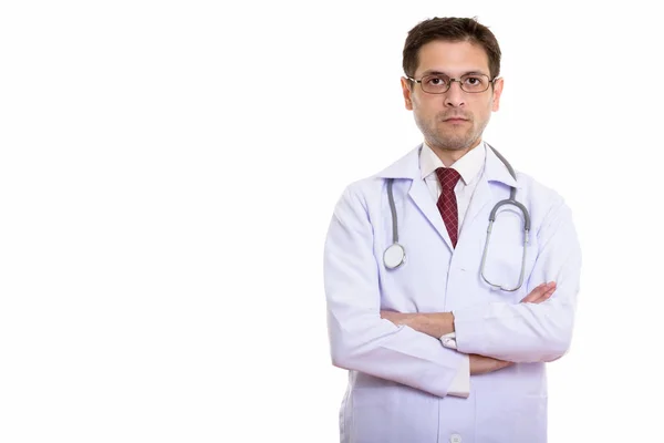 Estúdio tiro de jovem médico vestindo óculos com braço cro — Fotografia de Stock