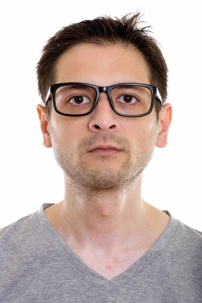 Gezicht van een jonge man met een bril op — Stockfoto