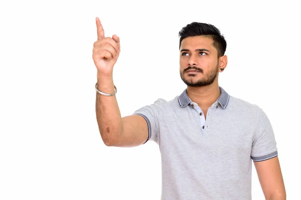 Mladý pohledný muž indické myšlení a ukazoval prstem — Stock fotografie