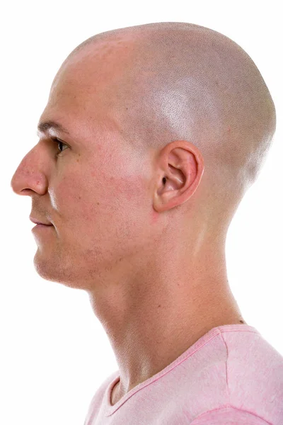 Profile view of face of fiatal jóképű kopasz férfi — Stock Fotó