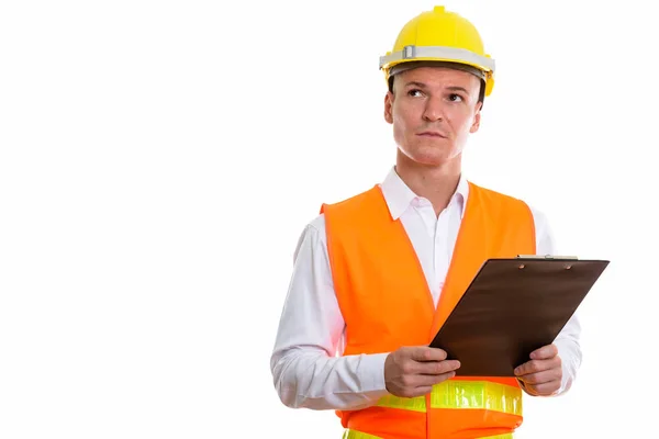 Estudio disparo de joven hombre guapo trabajador de la construcción celebración cl —  Fotos de Stock