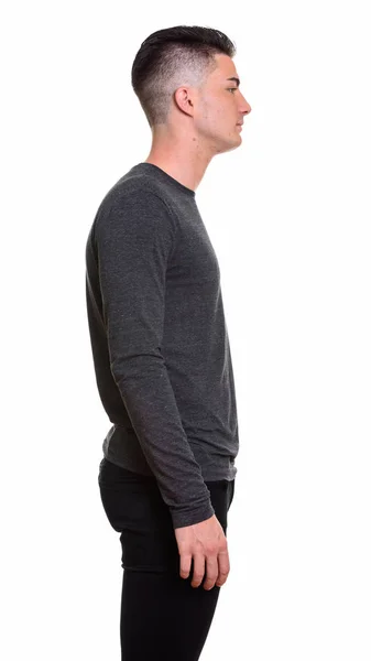 Profile view of young handsome man standing — Stock Photo, Image