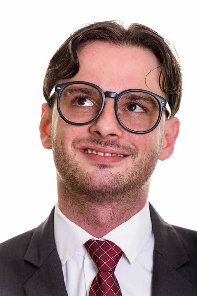 Fiatal, boldog üzletember visel szemüveget, míg a mosolygó arc — Stock Fotó
