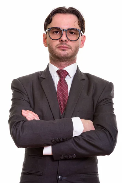 Studioaufnahme eines jungen Geschäftsmannes mit Brille und Waffen — Stockfoto