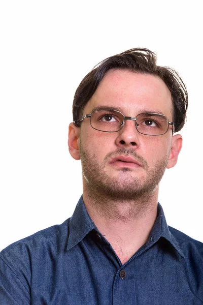 Face of formal young man thinking while wearing eyeglasses — Stock Photo, Image