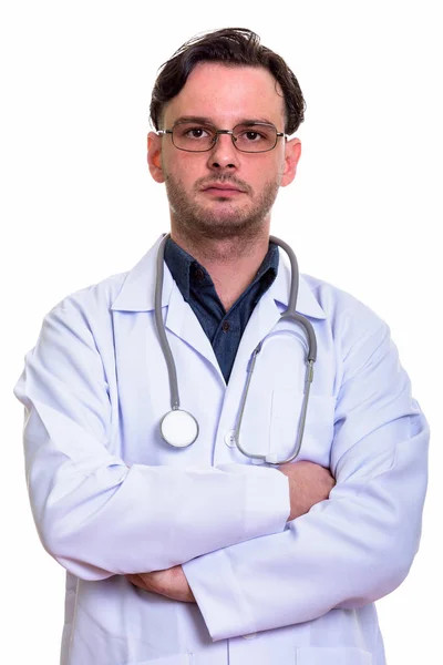 Närbild på ung man läkare med armarna korsade — Stockfoto