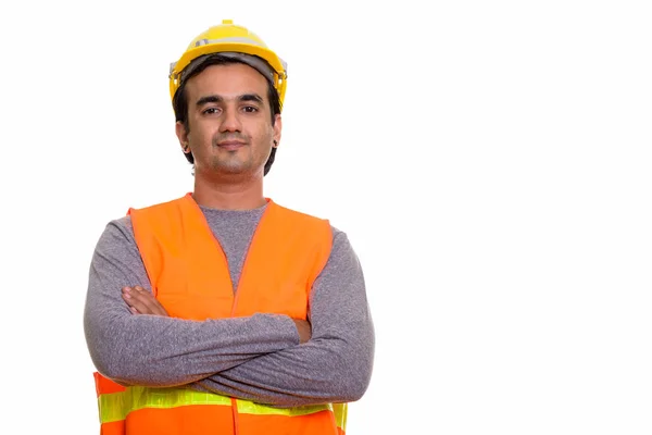 Estúdio tiro de homem persa trabalhador da construção com braços cruzados — Fotografia de Stock