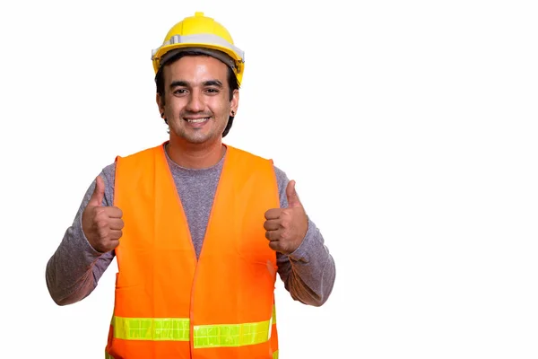 Başparmak verirken gülümseyen mutlu Farsça adam inşaat işçisi — Stok fotoğraf